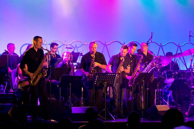 The Horn section of David Perrico's Pop Evolution, an 18-piece band featuring musicians from various Las Vegas productions, performs inside the showroom at the Stratosphere, July 2, 2013.